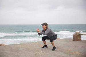 Woman exercising outdoors representing brain health benefits of exercise and creatine for cognitive function and healthy aging.
