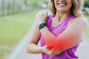 Midlife woman with joint pain due to inflammation which does not support exercise and feeling energetic.