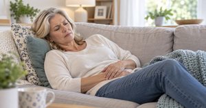 Postmenopausal woman feeling healthy and comfortable while focusing on urinary and bladder health.